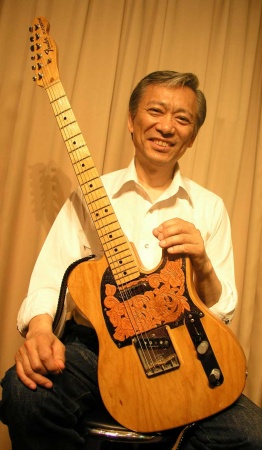 Хисаси Комацу